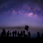 people in night sky